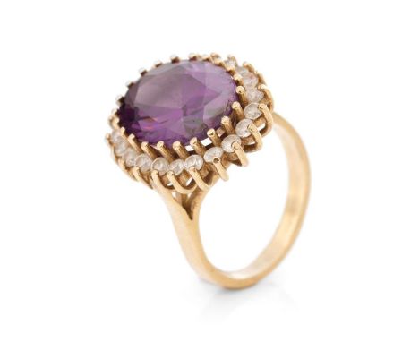 9ct gold ring set with CZs and a large amethyst style stone, 9.7 grams, size Q.  