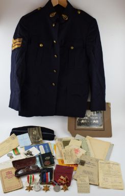 A collection of military items relating to SGT Johnson of the Royal Signals Corps, 2345385 b 01/08/1914, to include dress uni