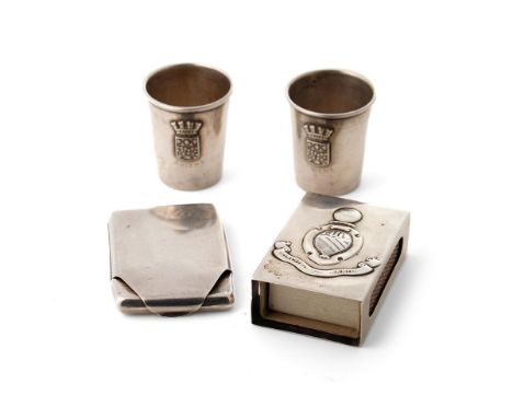A collection of silver items to include cognac cups of WWI interest with Amiens crest, a William Cooper matchbox with crest h