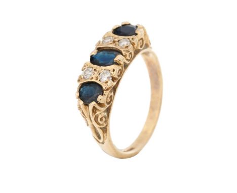 9ct gold ring set with 4 diamonds and 3 larger sapphires, 3.6 grams, size P.  