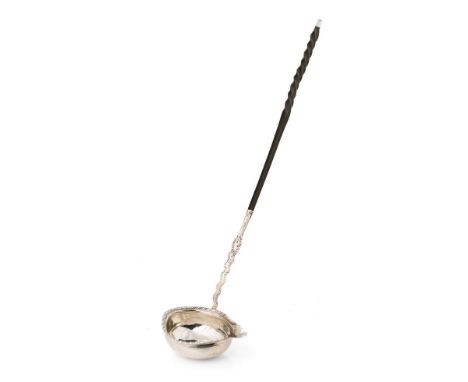 Antique silver punch ladle with ebonised wooden handle, hallmarks rubbed, believed Georgian, 37cm long.  