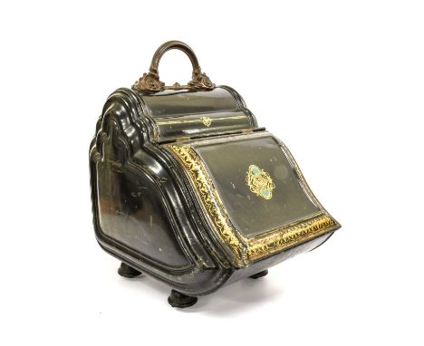 A Victorian Toleware Coal Purdonium, probably by Benham &amp; Sons, with scroll cast handle, the hinged cover gilt with strap