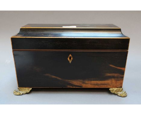 A Mid 19th Century Coromandel Tea Caddy, the waisted rectangular top opening to reveal a twin compartment and a single mixing