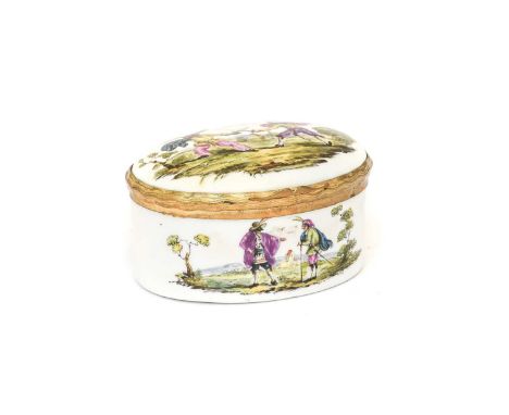 A Gilt Metal Mounted German Porcelain Snuff Box and Cover, 19th century, of oval form, painted with commedia del'arte figures