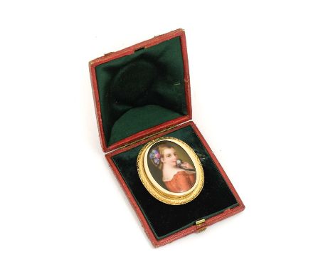 A German Porcelain Portrait Plaque, late 19th century, of oval form, painted with a bust portrait of a young girl holding a b