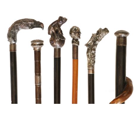 A White Metal Mounted Walking Stick, the ferrule London 1984, with handle as the head of an eagle94cm longThree Various White