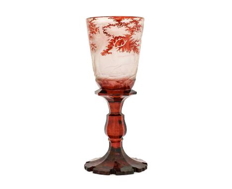 A Bohemian Ruby Overlay Clear Glass Goblet Vase, 19th century, the rounded funnel bowl engraved with deer in a forest, on a p