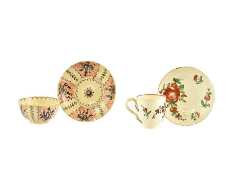 A Creamware Tea Bowl and Saucer, circa 1770, painted in the manner of Robinson and Rhodes with black and red brocadeA Similar