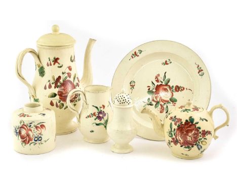 A Creamware Teapot and Cover, circa 1770, of ovoid form with leaf sheathed spout and handle, painted with floral sprays17cm l
