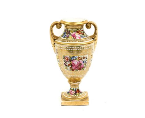 A Coalport Vase, circa 1810, of twin-handled urn form, painted with a panel of flowers on a Church Gresley type ground24.5cm 