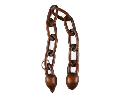 A Welsh Treen Love Spoon, 19th century, with sixteen-ring chain57cm long overallA Treen Love Token, as an eight-link chain wi