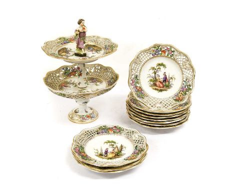 A Meissen Style Porcelain Dessert Service, late 19th century, painted with romantic 18th century figures in landscapes within