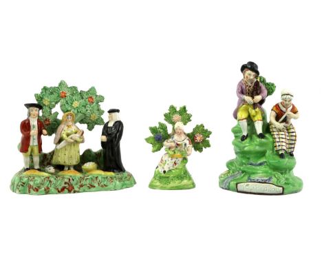 A Pearlware Figure Group, circa 1820, as a boy and girl playing musical instruments on a mound base titled "Village Group"16.