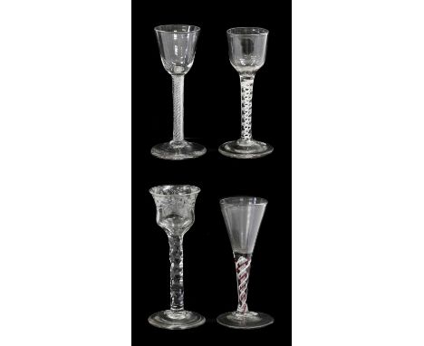 A Wine Glass, circa 1750, the ogee bowl on an opaque twist stem14.5cm highA Similar Air Twist Glass15cm highA Wine Glass, the