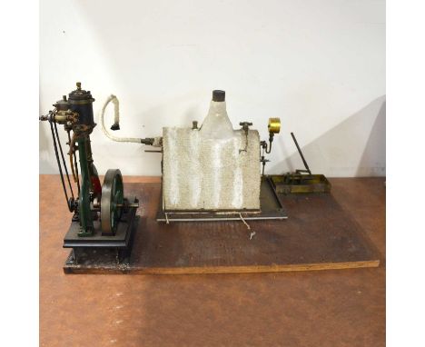 A Stuart stationary steam model engine, height 35cm, width 15cm, mounted on wooden base, with parts boxCondition report:Addit
