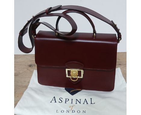 An Aspinal of London red leather handbag with shoulder strap and dust bag.Condition:- Light general wear, no sign of any dama