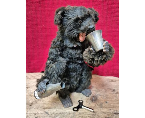 A Victorian Drinking Bear Automaton, height is 32cm, probably by Roullet & Decamps.Condition:- General wear throughout with w
