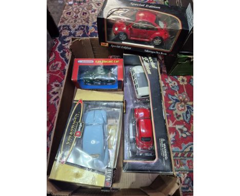 A box of assorted Volkswagen model vehicles, in original boxes.
