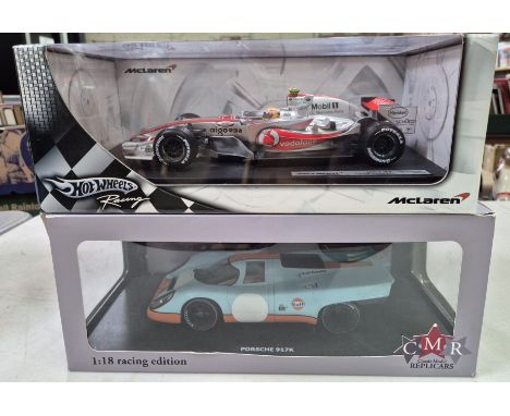 A Hot Wheels 1:18 model Mclaren MP4-22 Lewis Hamilton &amp; a CNR 1:18 model Porsche 917k racing edition, both in original bo