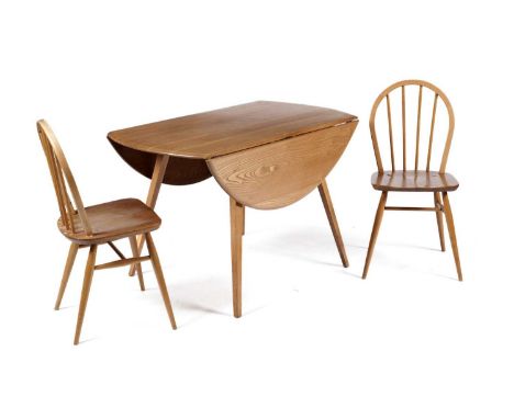 Lucian Ercolani for Ercol: A retro drop leaf beech and elm table, model 284, and two chairs, Model 400 - the drop leaf table 