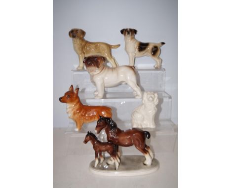 Group of figurines to include Beswick spaniel, Melba ware bulldog etc