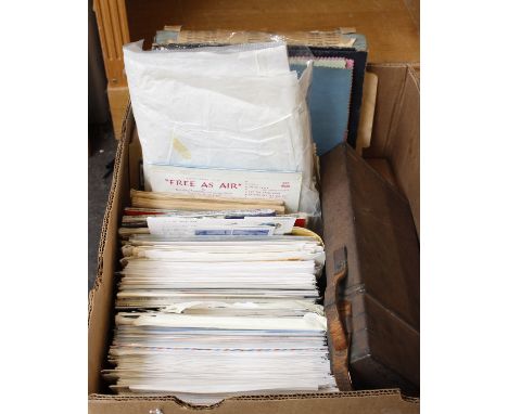 A Box of Collector's Items Including Stamps and Militaria.A large collection of stamps, a button polishing tool and a metal b