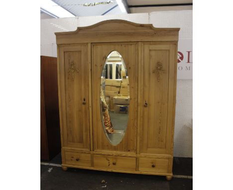 A Substantial Federal Three Door Pine Wardrobe With Mirrored Door With a mirrored central door and relief details to outer do