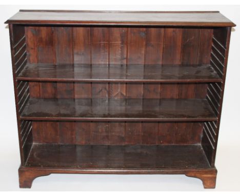 An early 20th century mahogany bookcase, with two adjustable shelves, on bracket feet, 106cm high, 126cm long, 33cm deep 