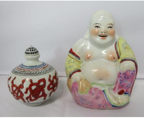 A Chinese ceramic model of a Buddha, along with a scent bottle 