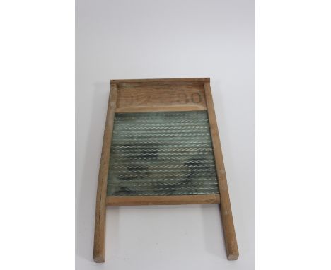 Advertising interest - a pine washboard stamped Scotch  Peerless  Scotland""