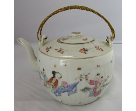 A Chinese ceramic teapot decorated with various figures and gilt metal swing handle, with a red seal mark to the base