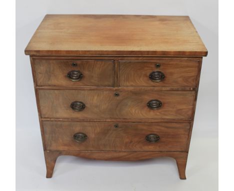 A 19th century chest of drawers, on bracket feet and original brass swing handles, 88cm high, 88cm long, 49cm deep 