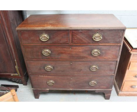 A 19th century mahogany chest of drawers, with brass swing handles each with a recumbent lion, on bracket legs, 106.5cm high,