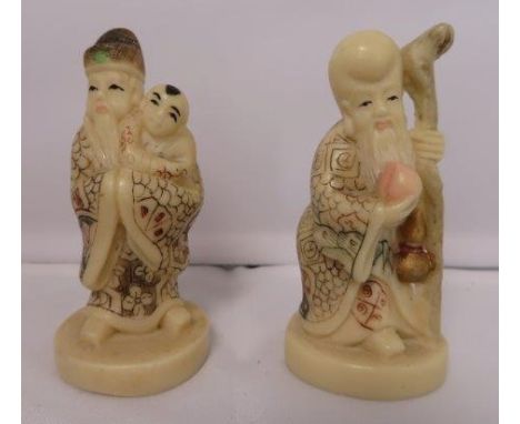 Two Chinese netsuke, one of a standing scholar, 10cm high