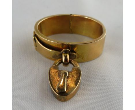 A Victorian gold scarf clip, unmarked, with padlock and hasp catch, 5.8 g gross
