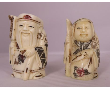 Two Chinese netsuke of standing male figures, 5.5cm high