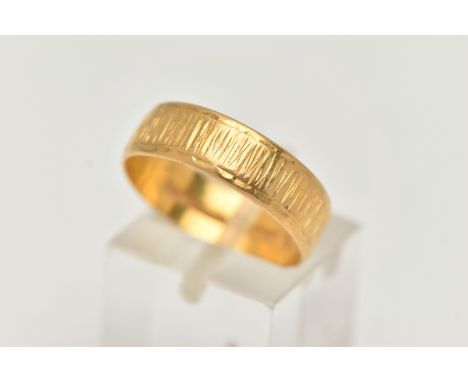 A 22CT GOLD TEXTURED BAND, approximate band width 5.9mm, hallmarked 22ct Sheffield, ring size Q leading edge, approximate gro