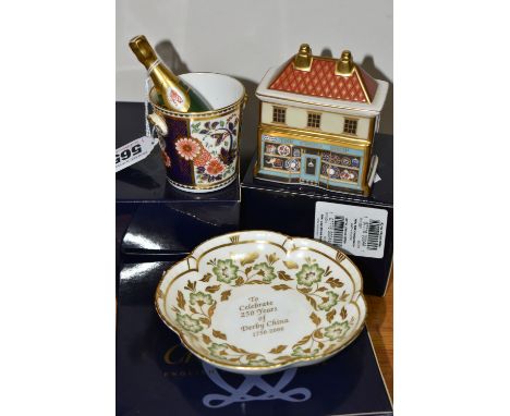 A GROUP OF BOXED ROYAL CROWN DERBY GIFTWARE, comprising a champagne bottle and ice bucket, 'The China Shop' from the Miniatur