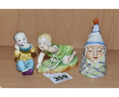 TWO ROYAL WORCESTER FIGURES AND A CANDLE SNUFFER, comprising 'Michael' no 2912, modelled by Freda Doughty, puce backstamp and