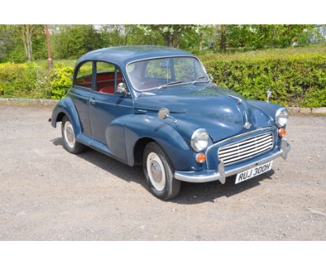 A 1970 MORRIS MINOR 1000 TWO DOOR SALOON CAR in blue with a 1098cc petrol engine, four speed manual gear box, red vinyl inter