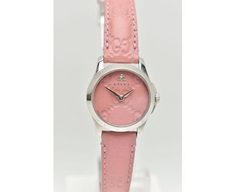 A 'GUCCI G TIMELESS' WRISTWATCH, quartz movement, round pink leather dial with embossed Gucci logo, signed 'Gucci' with bee l