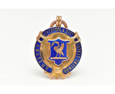 A 9CT GOLD ENAMEL FOB MEDAL, circular form with blue enamel detail, inscribed 'Liverpool &amp; Dist, Amateur Bowling league',