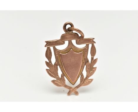 A 9CT ROSE GOLD SHEILD FOB MEDAL, vacant cartouche, fitted with a jump ring for suspension, length including bail 35mm, hallm