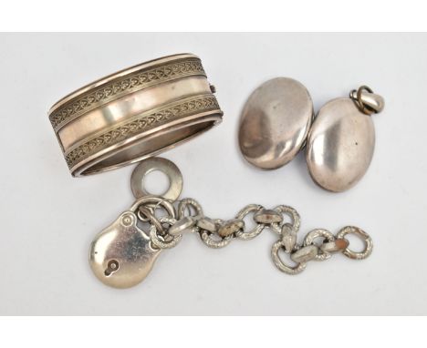 THREE ITEMS OF WHITE METAL JEWELLERY, to include a wide hinged bangle, fitted with a push button clasp, stamped 'Sterling Sil