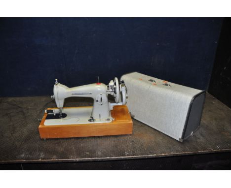 A FRISTER &amp; ROSSMAN MODEL 25 MANUAL SEWING MACHINE with cover (handle to top missing)