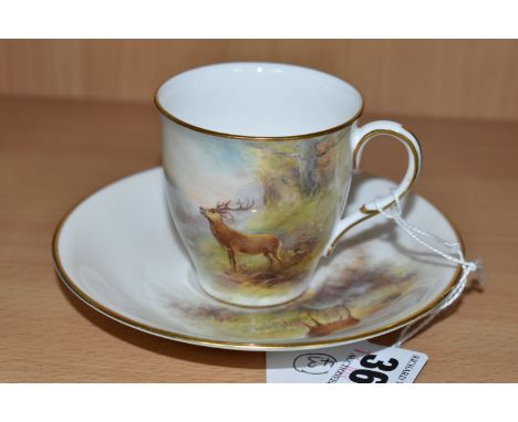 A ROYAL WORCESTER 'MAPLE' CABINET CUP AND SAUCER BY HARRY STINTON, painted with stags in a naturalistic setting, each piece s