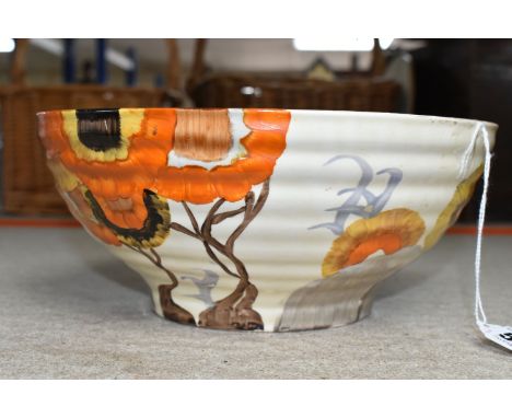 A CLARICE CLIFF BIZARRE BOWL, in Rhodanthe pattern, the ribbed bowl painted with flowers in autumnal colours on a cream groun