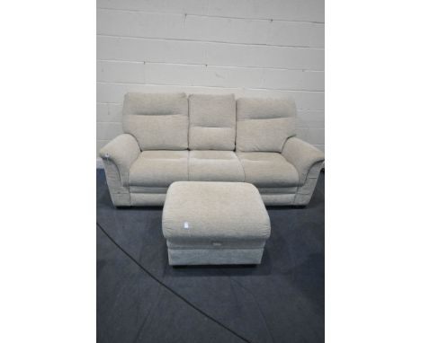 A CREAM UPHOLSTERED PARKER KNOLL THREE SEATER SOFA, length 206cm, and a matching footstool (condition report: good condition)