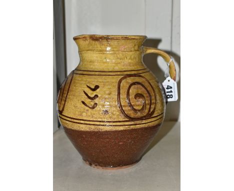 MICHAEL CARDEW (1901-1983) FOR WINCHCOMBE POTTERY, a slip decorated jug with impressed Cardew and Winchcombe marks to the bas