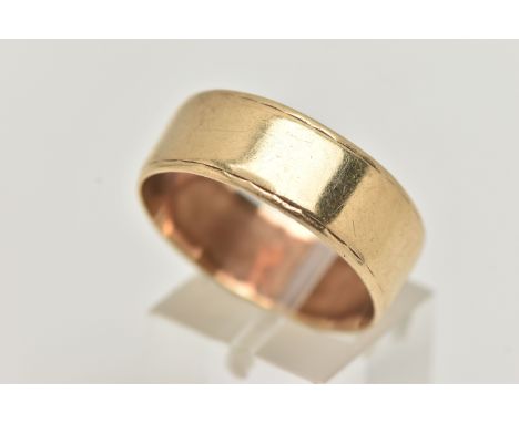 A 9CT GOLD WIDE POLISHED BAND, approximate band width 8.7mm, hallmarked 9ct London, ring size W leading edge, approximate gro